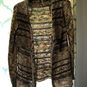 Cream and navy sweater.